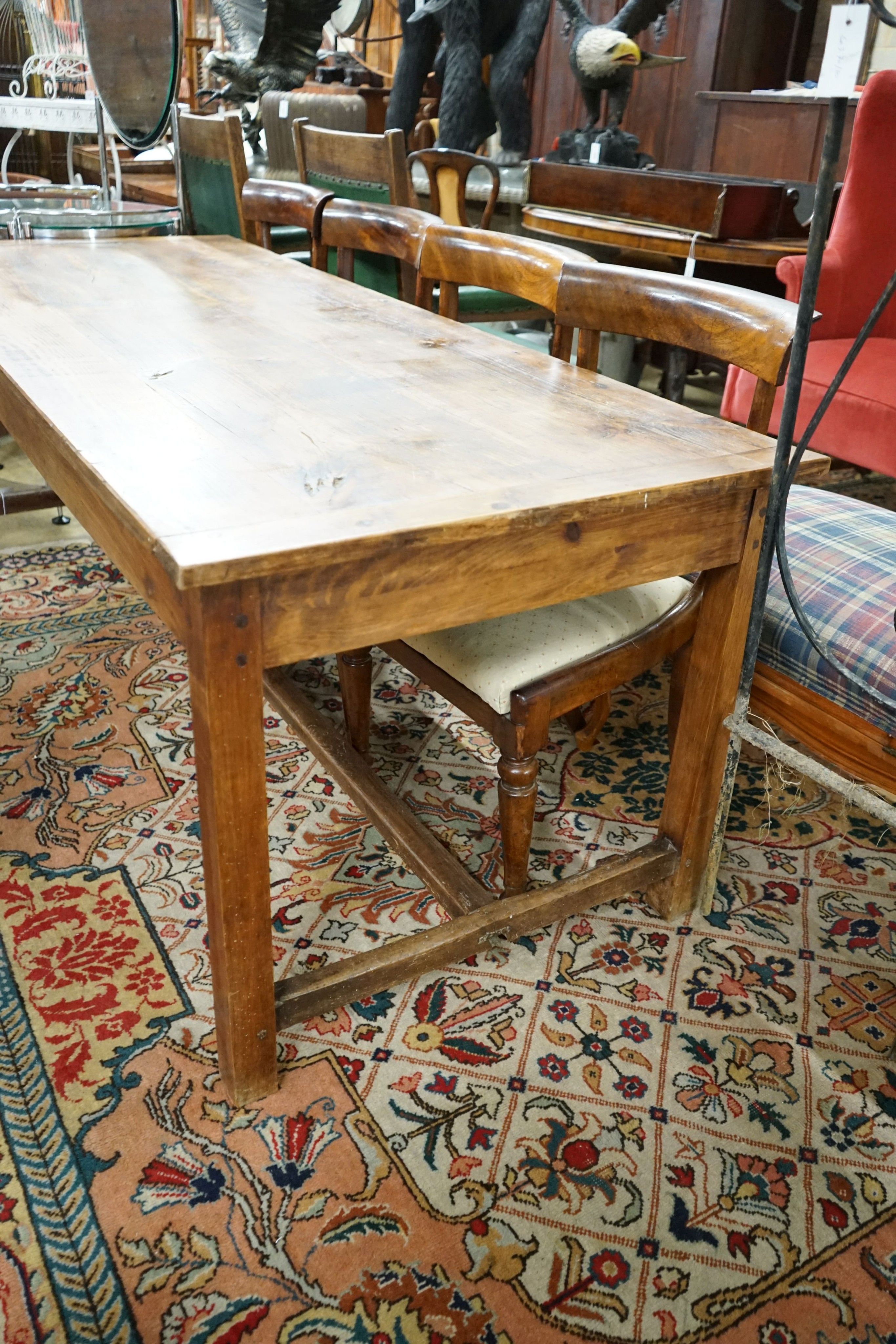 A 19th century French pine and fruitwood rectangular kitchen table, length 200cm, width 79cm, height 73cm